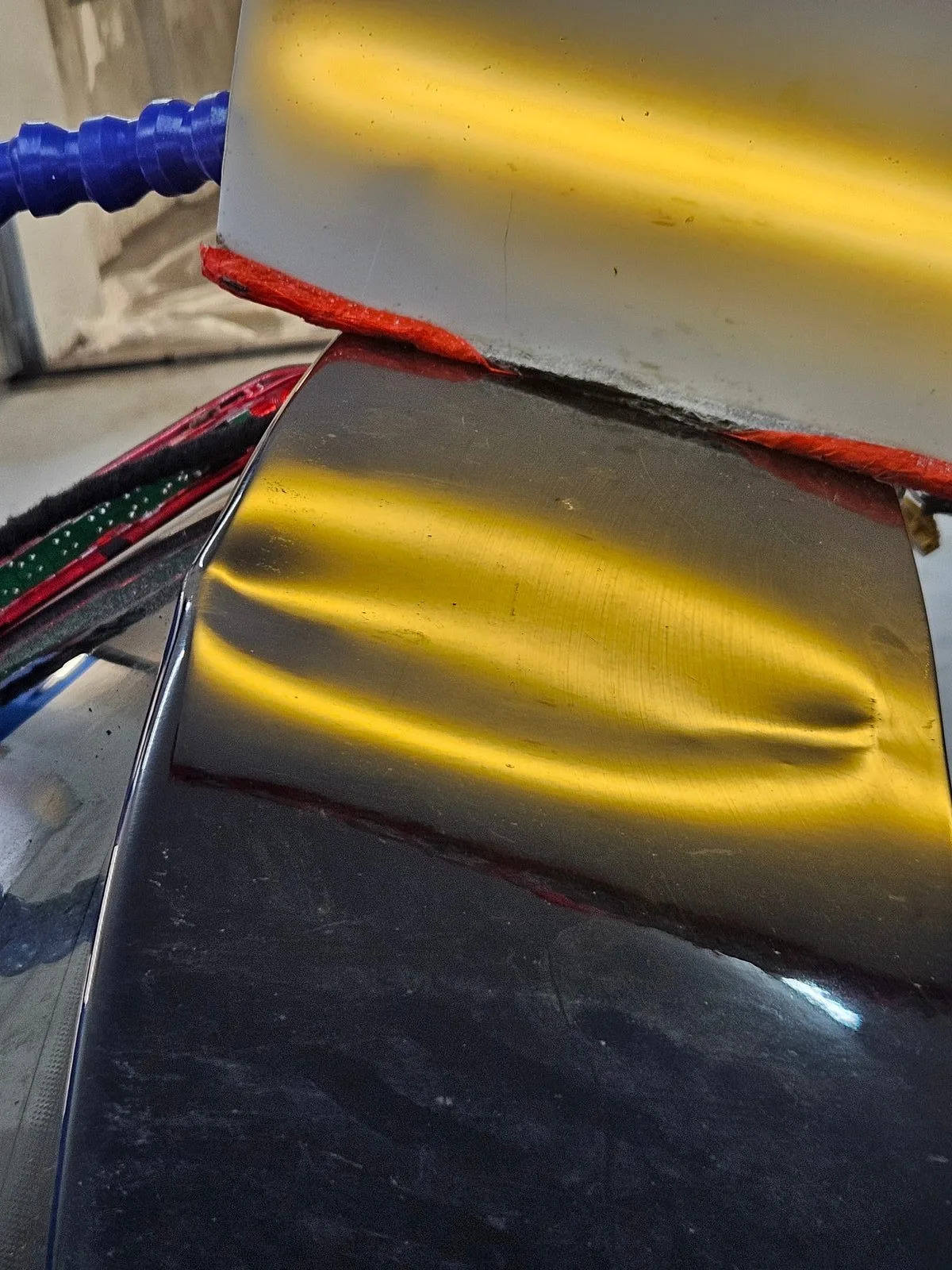 Delle am Kofferraum — vorher/nachher PDR-Reparatur