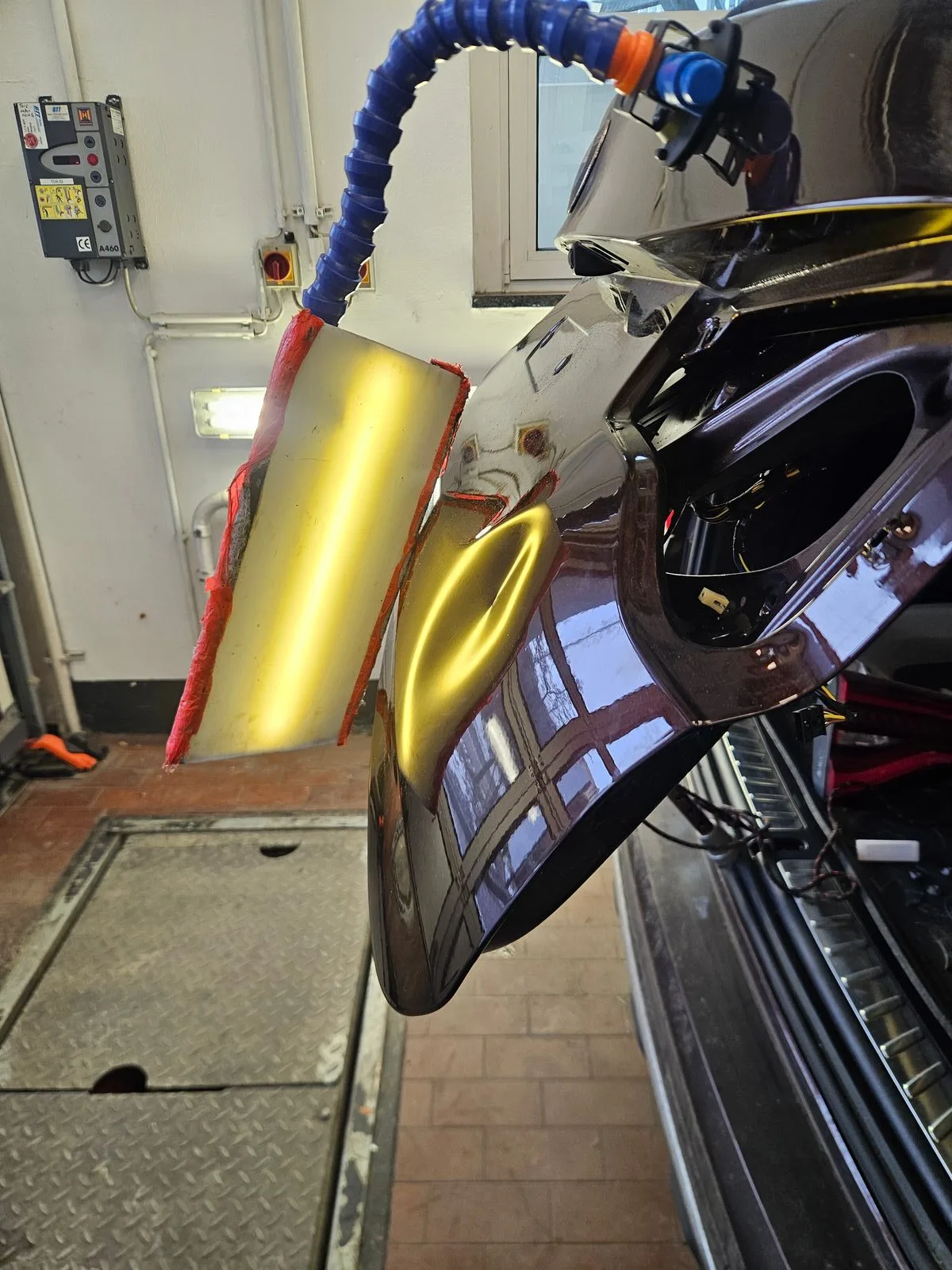 Delle an der Heckklappe — vorher/nachher PDR-Reparatur